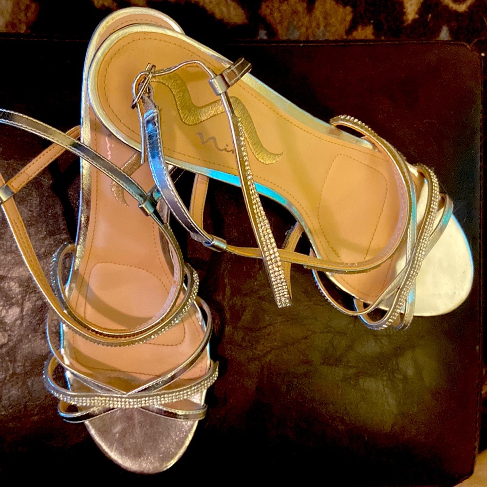 Silver and rhinestone low wedge party shoes.